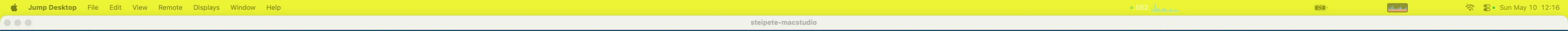 Real macOS menu bar with BlackBar running on a yellow desktop — green dot, active vCPU count, sparkline